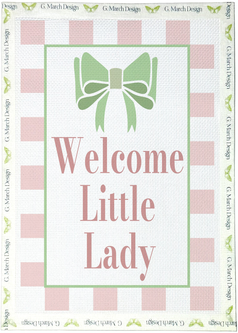 “Little Lady needlepoint canvas with a green bow, pink-and-white checked border and pink ‘Welcome Little Lady’ lettering.”